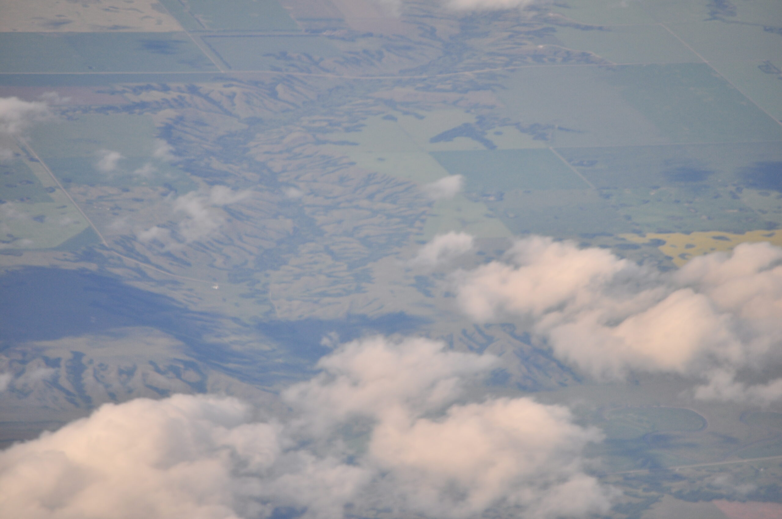 Aerial photograph of Canadian prairie patchwork landscape near Saskatchewan used for topographic mapping and land survey