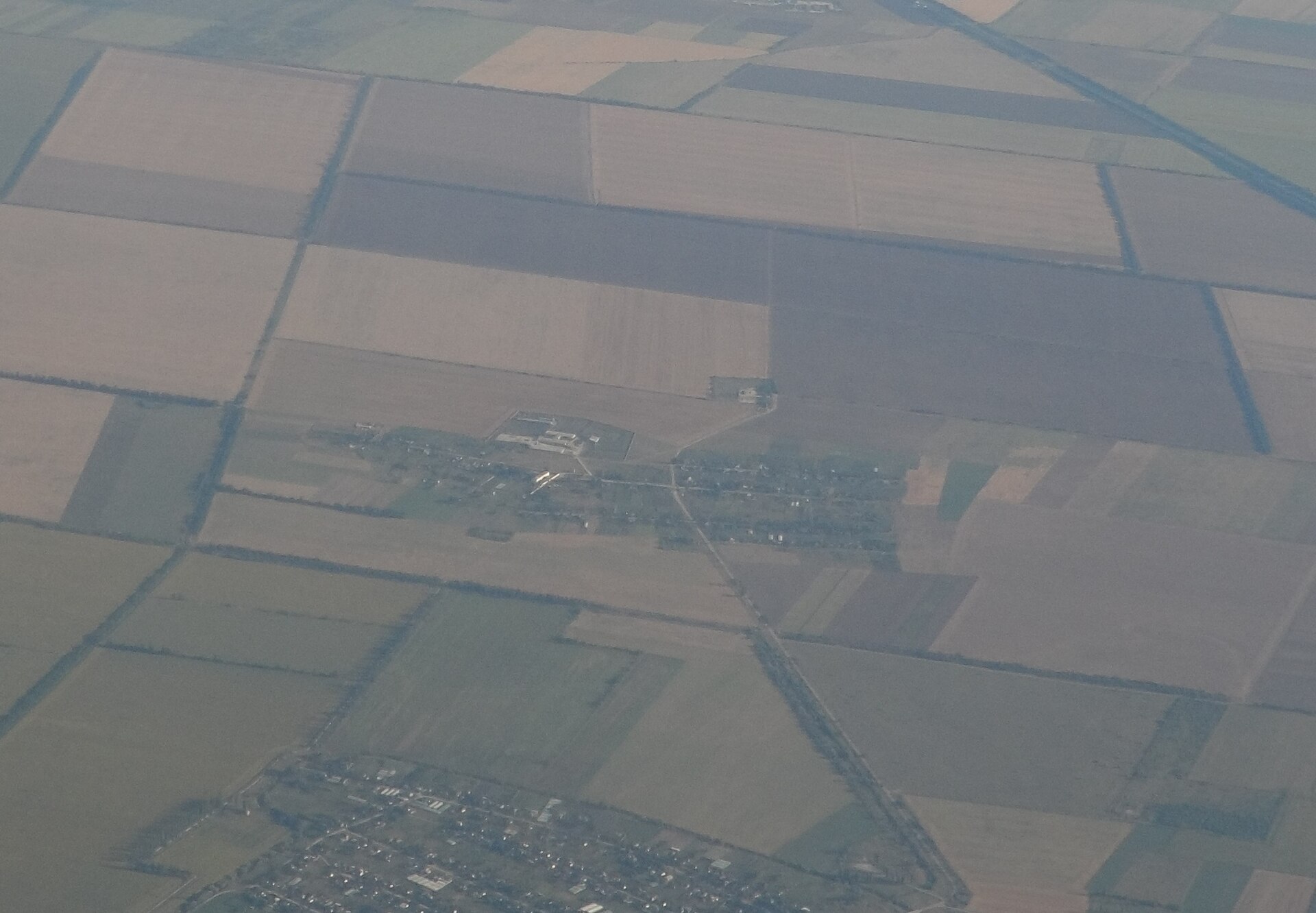 Aerial overhead view of farmland and fields representing precision survey and mapping data collection